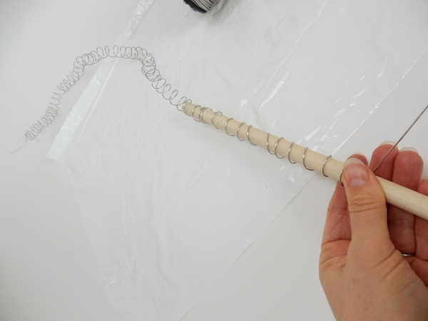 Allow the wire to slip of the dowel and continue to wrap Allow the wire to slip of the dowel and continue to wrap