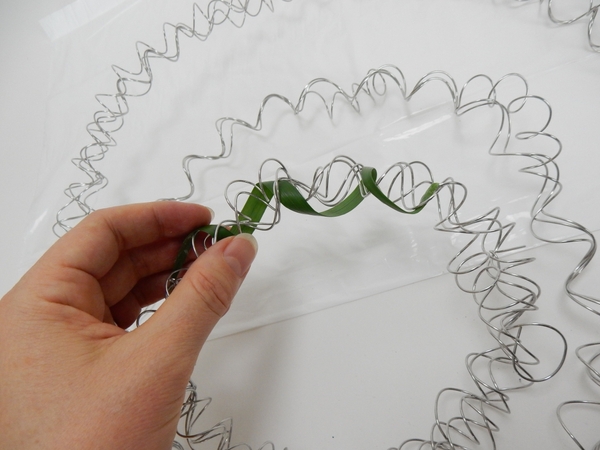 And spiral it around the coil. And spiral it around the coil.