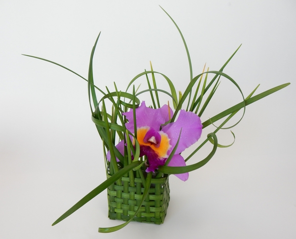 What is in a basket of spectacular floral art design What is in a basket of spectacular floral art design