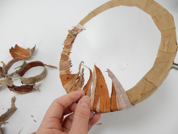 Work your way outwards leaving long strips pointing into the shape Work your way outwards leaving long strips pointing into the shape