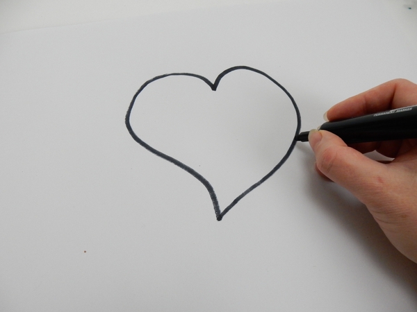 Draw a heart shape on paper Draw a heart shape on paper