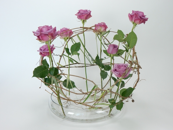 Roses in a grapevine armature Roses in a grapevine armature