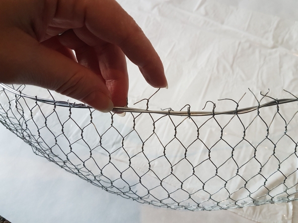 Cut the chicken wire to fit your shape. Cut the chicken wire to fit your shape.