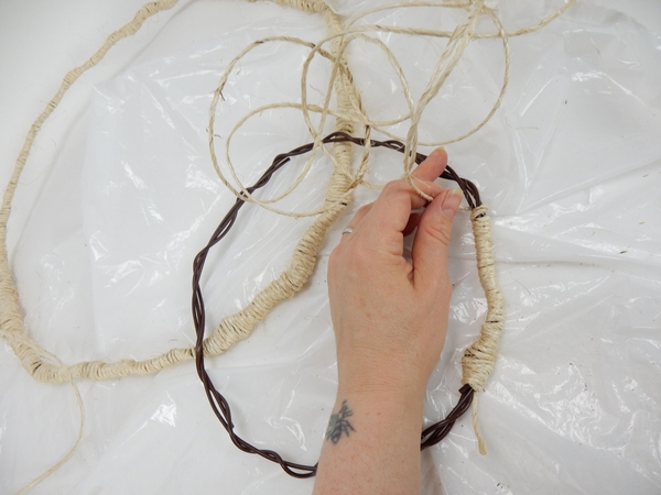 Wrap the second wreath in the same way as the first Wrap the second wreath in the same way as the first