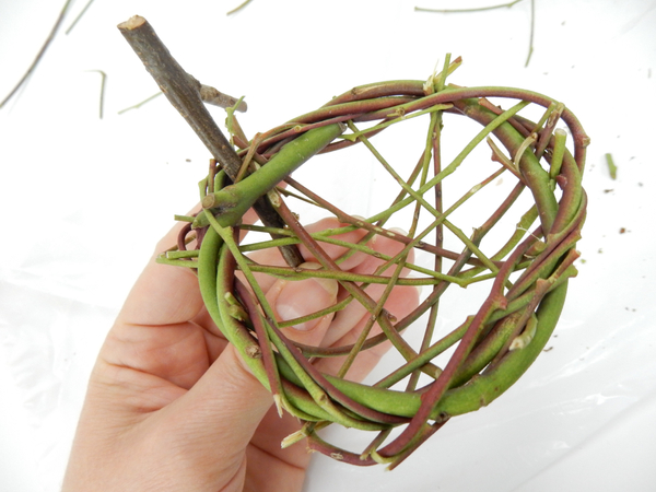 Make sure the twig hook is secure by weaving in extra stems