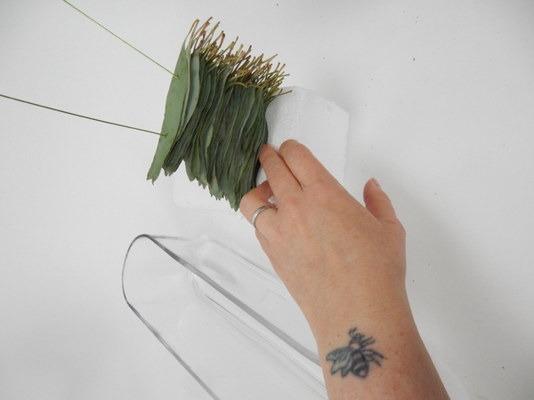 Create a stack of skewered leaves. Create a stack of skewered leaves.