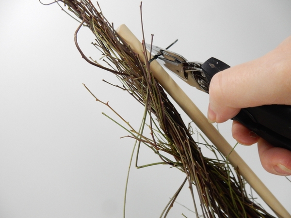 Cut away the long end of the cable tie Cut away the long end of the cable tie