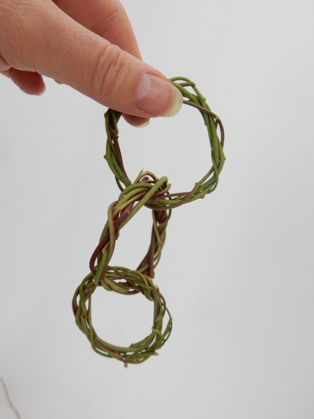 Thread through another stem and weave another wreath Thread through another stem and weave another wreath