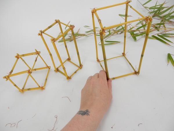Finish off the cube by fitting the remaining panel onto these “legs” and wiring it securely to the first panel. Finish off the cube by fitting the remaining panel onto these “legs” and wiring it securely to the first panel.