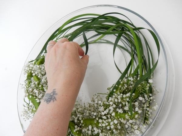 Curl, curve and drape some lily grass to complete the shape Curl, curve and drape some lily grass to complete the shape
