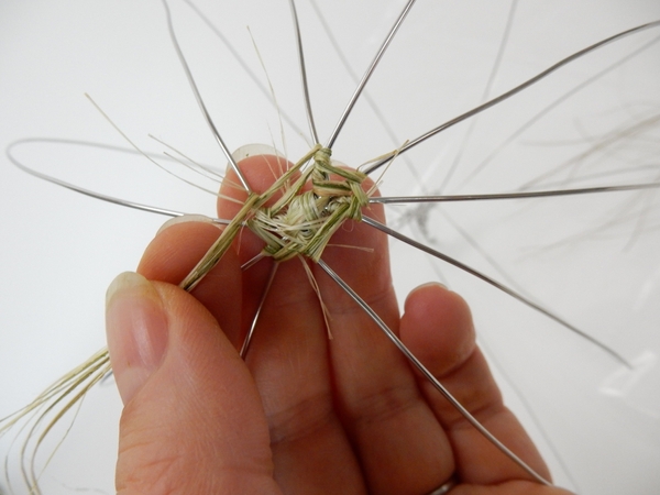 Continue to wrap the flax around the wire Continue to wrap the flax around the wire
