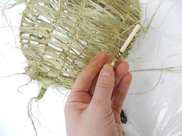 Curl a few dangling bits of flax Curl a few dangling bits of flax