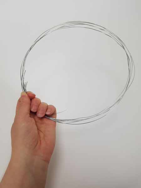 Shape the wire in a circle Shape the wire in a circle