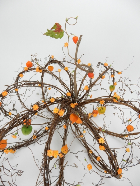Kalanchoe and Physalis on a tendril Fall wreath pumpkin Kalanchoe and Physalis on a tendril Fall wreath pumpkin