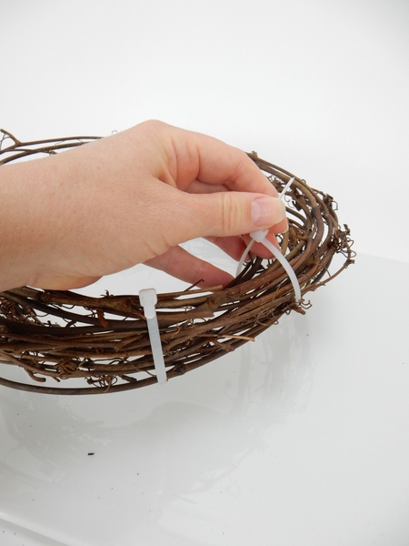 Secure the wreaths with two cable ties Secure the wreaths with two cable ties