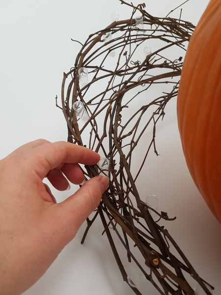 Add in the tiny water tubes for the flowers and glue in the plant material Add in the tiny water tubes for the flowers and glue in the plant material
