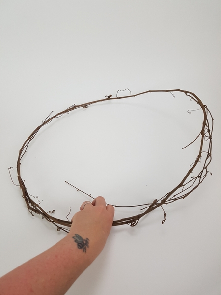 Bend the wreath in a large circle Bend the wreath in a large circle