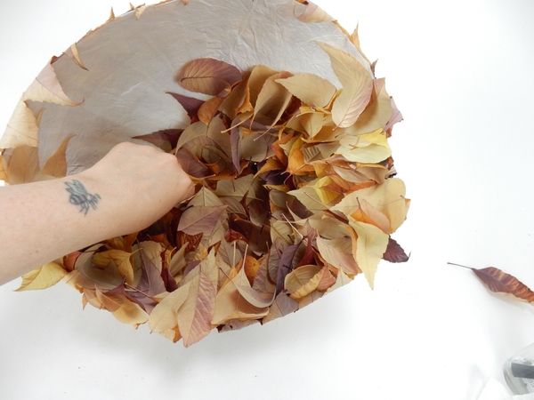 Glue the leaves tightly so that no paper will show when it shrinks as it dries Glue the leaves tightly so that no paper will show when it shrinks as it dries