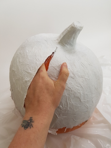 Slip your hand between the wrap and the paper and wiggle it from the shape. Slip your hand between the wrap and the paper and wiggle it from the shape.
