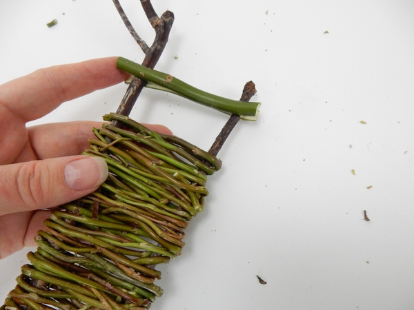 Wiggle the split twig down the forked twigs as you go along Wiggle the split twig down the forked twigs as you go along