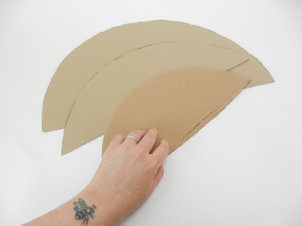 Cut a third cardboard circle Cut a third cardboard circle