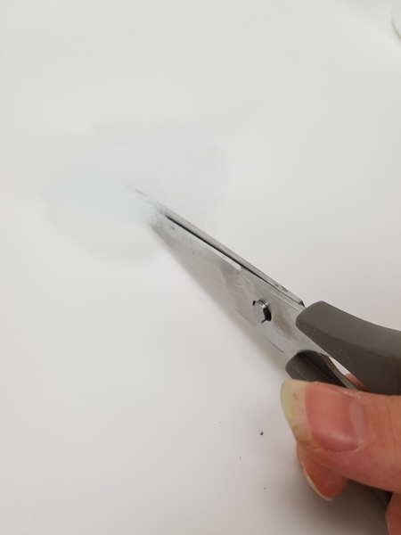 Cut a disk out of the stuffing so that it covers the entire base of the tree Cut a disk out of the stuffing so that it covers the entire base of the tree