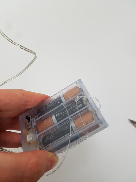 Split the line and slip the battery pack into the gap Split the line and slip the battery pack into the gap