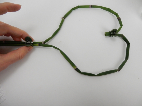 Add a bit of glue to the bottom where the shoots connect and glue Add a bit of glue to the bottom where the shoots connect and glue