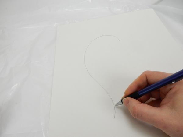 Draw one half of a curvy heart on paper. Draw one half of a curvy heart on paper.