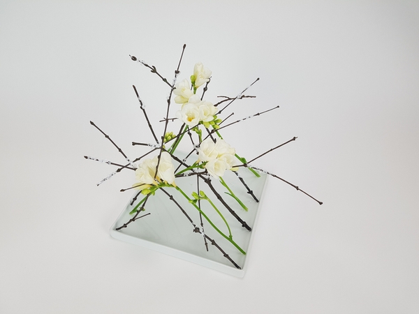 Frosted twig and freesia design Frosted twig and freesia design