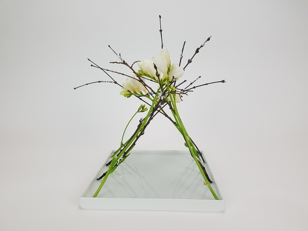 Frosted twig and freesia floral design Frosted twig and freesia floral design
