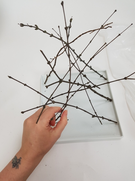I make sure each leg is connected to another leg at three places so that it is stable enough to carry my flowers I make sure each leg is connected to another leg at three places so that it is stable enough to carry my flowers