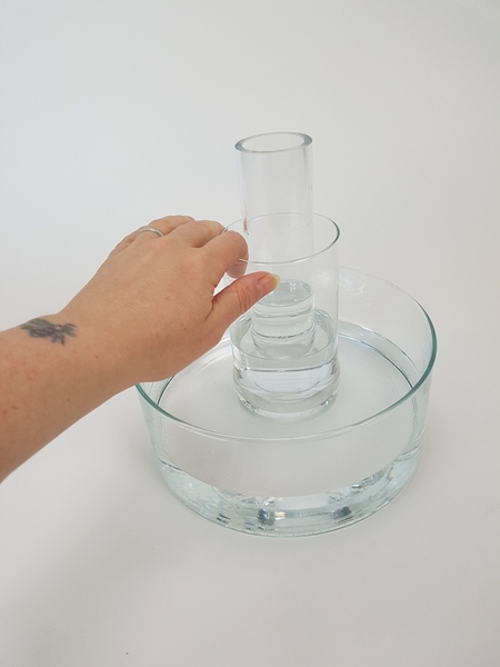 Fill the containers with water Fill the containers with water