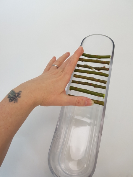 For half of my container I placed the twigs in a parallel pattern For half of my container I placed the twigs in a parallel pattern