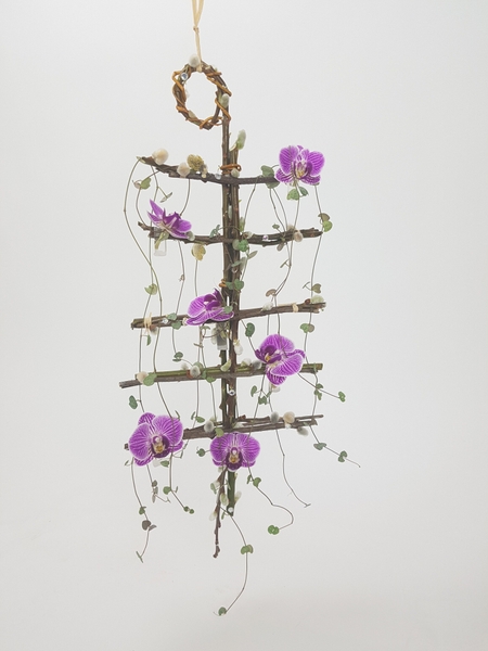 Phalaenopsis, rosary vine and pussy willow floral mobile Phalaenopsis, rosary vine and pussy willow floral mobile