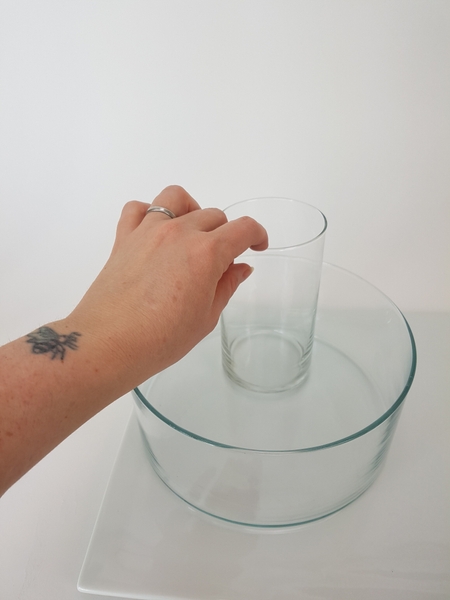 Place a smaller container inside the first Place a smaller container inside the first