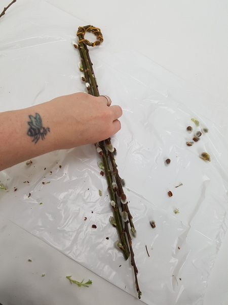Place the stems together on a flat working surface Place the stems together on a flat working surface