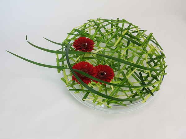 Lily grass and gerbera floral design