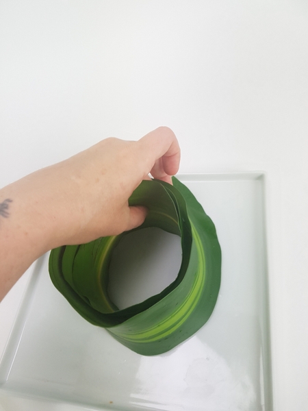 Curl about 4 leaves into a tube Curl about 4 leaves into a tube