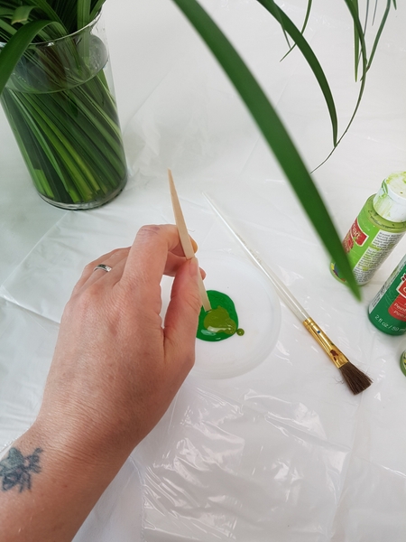 Mix paint to be the exact colour of the lily grass Mix paint to be the exact colour of the lily grass
