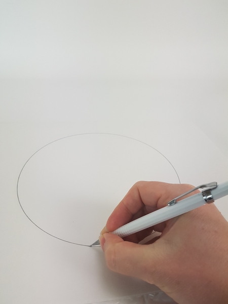 Draw a circle on paper. Draw a circle on paper.