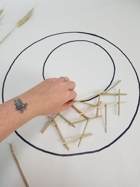 For a sturdy wreath armature make sure you glue each snippet at least at 3 points to another grass snippet For a sturdy wreath armature make sure you glue each snippet at least at 3 points to another grass snippet