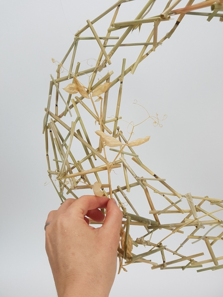 Weave in a few sweet pea vines Weave in a few sweet pea vines