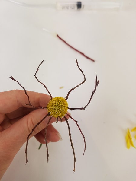 Add a tiny forked twig as fangs. Add a tiny forked twig as fangs.