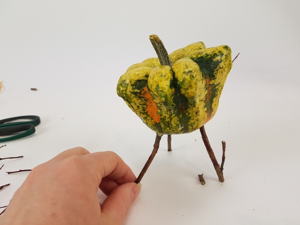 And position the pumpkin to stand on it's three legs And position the pumpkin to stand on it's three legs