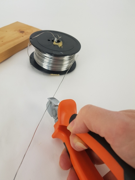 Cut wire at a sharp angle Cut wire at a sharp angle