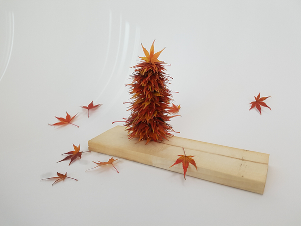 Easy to make Christmas tree from autumn leaves