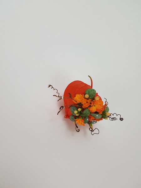 Kalanchoe in a Physalis pod flower arrangement Kalanchoe in a Physalis pod flower arrangement