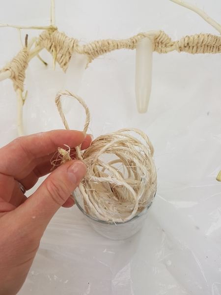 Dip sisal in a glue and water mixture Dip sisal in a glue and water mixture