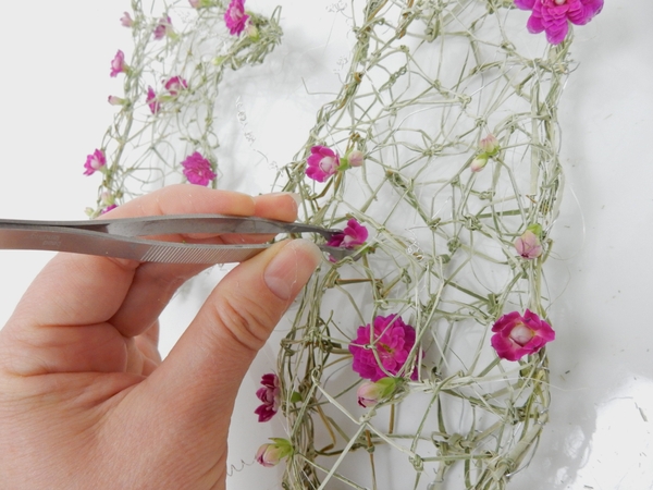 Glue the floral details into the design Glue the floral details into the design